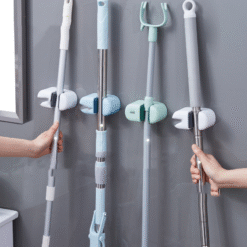 Front close-up of adhesive mop holder on bathroom wall