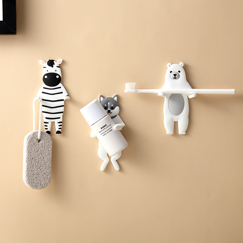 Cute animal-shaped wall hook with double bendable arms, adhesive mount