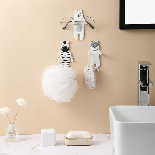 Cute animal-shaped wall hook with double bendable arms, adhesive mount