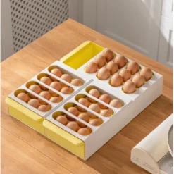 Compact plastic drawer-style egg storage box for 12 eggs