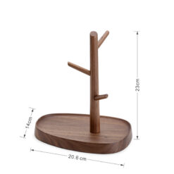 Nordic-style wooden key holder placed on a console table with accessories
