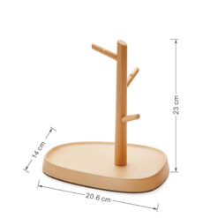 Nordic-style wooden key holder placed on a console table with accessories