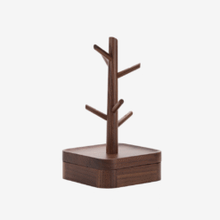Decorative key rack with branch design and small storage compartment