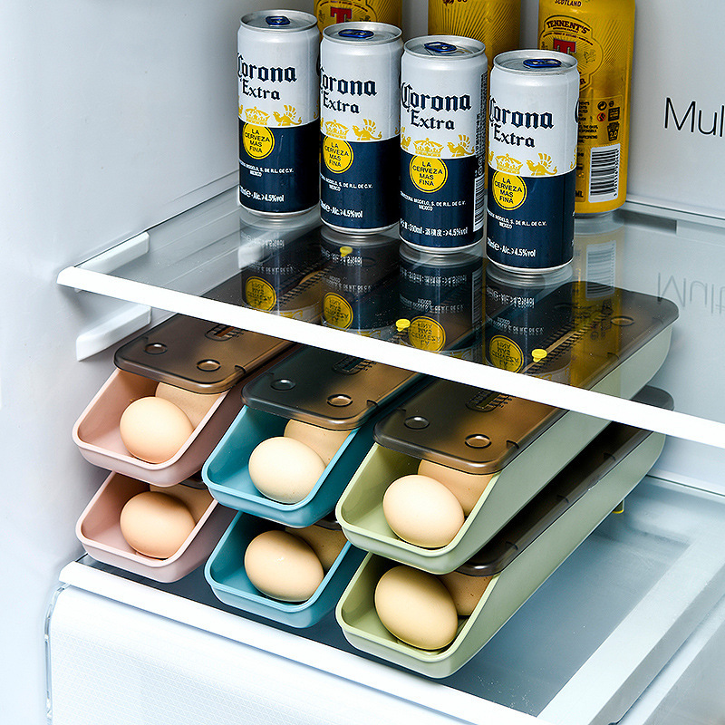 Egg storage box placed in fridge shelf with rolling eggs