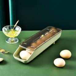Automatic rolling egg storage box with transparent lid in green
