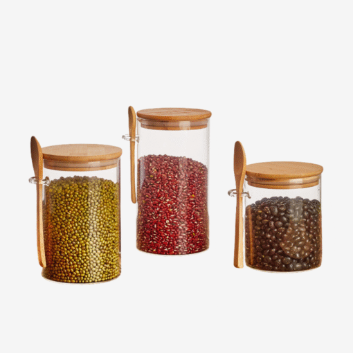 Transparent glass storage jar with wooden spoon and lid for kitchen pantry organizati