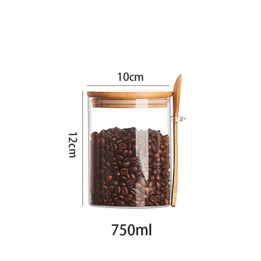Transparent glass storage jar with wooden spoon and lid for kitchen pantry organizati