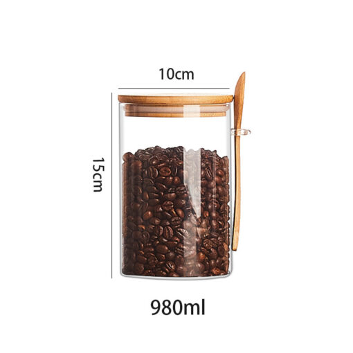 Transparent glass storage jar with wooden spoon and lid for kitchen pantry organizati